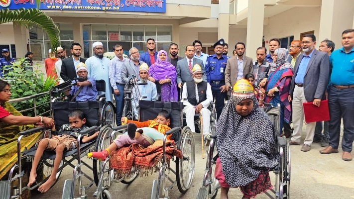 নেত্রকোণায় আন্তর্জাতিক প্রতিবন্ধী দিবস উপলক্ষে র্যালী, সভা ও হুইল চেয়ার বিতরণ